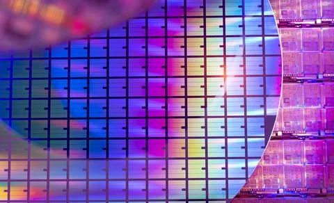 Silicon Wafers with microchips used in electronics for the fabrication of i.. Stock Photos