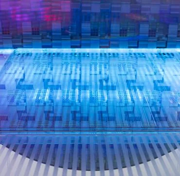 Silicon Wafers with microchips used in electronics for the fabrication of i.. Stock Photos