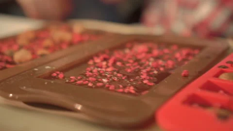 Silicone forms for handmade chocolate bars with nuts and dried raspberries Stock Footage 202189736