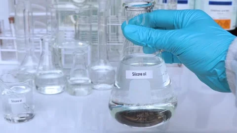 Silicone oil in container Stock Footage 242698559