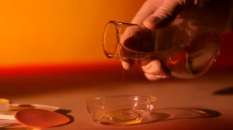 Silicone is poured from the flask Stock Footage 42017194