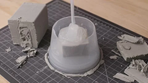 Silicone Pouring Over Clay Mold Stock Footage 204990761