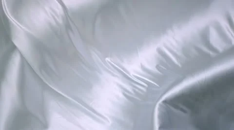 Silk bed sheet making big waves Stock Footage 12869579