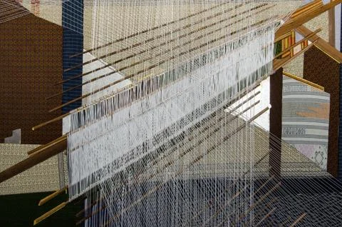 Silk fabric, hand weaving yarn process in Thailand Stock Photos