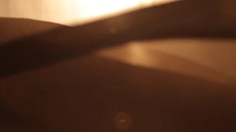 Silk flowing gently with sunflare Stock Footage 167734977