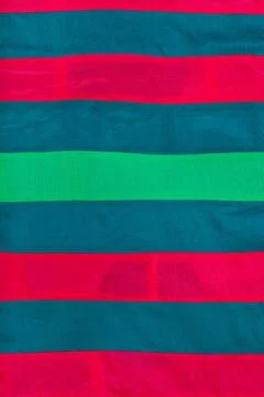Silk patchwork with red, blue, green stripes textile background - striped ... Fotos de archivo