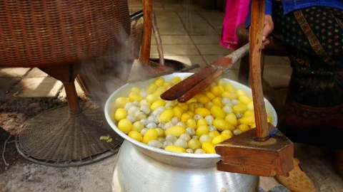 Silk reeling is the process by which a number of cocoon Stock Footage 84539393