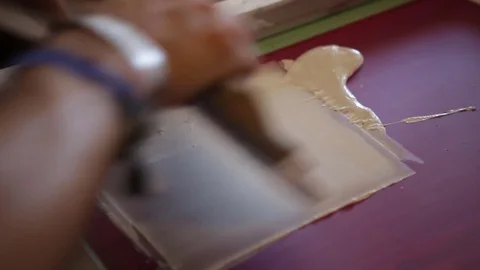 Silk Screen printing manufacturing on t-shirts print Stock Footage 76842484