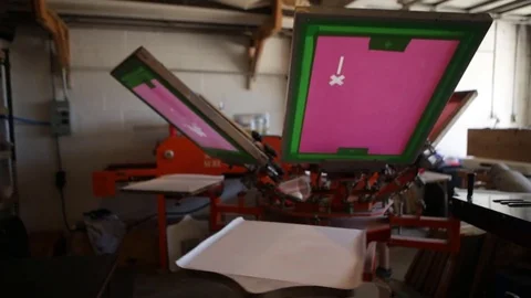 Silk Screen printing manufacturing on t-shirts print Stock Footage 76842823