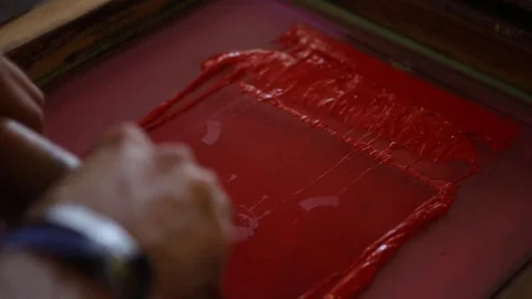 Silk Screen printing manufacturing on t-shirts print Stock Footage 76843948