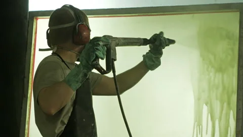 Silk screen printing process - cleaning a screen with water. Stock Footage 96177647