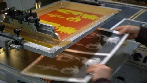 Silk screen printing process at the factory Stock Footage 120906079