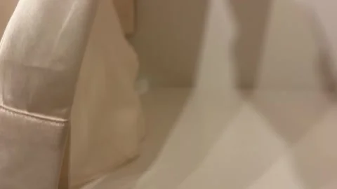 Silk Shirt Being Gently Moved on Clothing Rack Видео 333222659