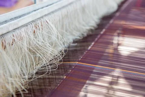 Silk string in weaving matchine tomake craftmanship Stock Photos