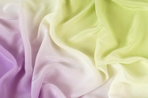 Silk texture violet yellow background Foto stock