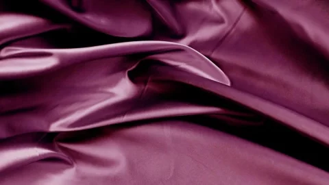A silk-textured background made of grape color fabric. Stock Footage 307643216
