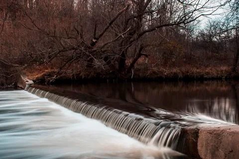 Silk like water flows down river Stock Photos