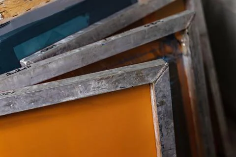 Silkscreen printing. silk screen mesh screen frames. serigraphy production Stock Photos