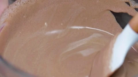 Silky Chocolate Mixture being Stirred Stock Footage 166863176