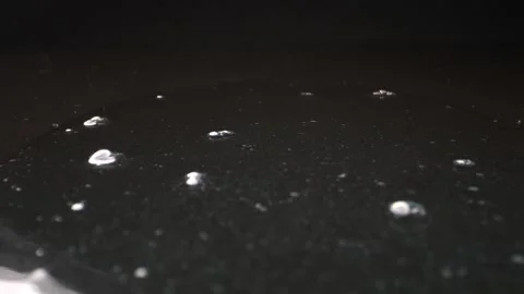 Silky clear gel with air bubbles, lit by studio lights, moves gracefully ov.. Stock-Footage 262528280