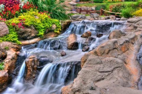 Silky waterfall in high dynamic range Stock Photos