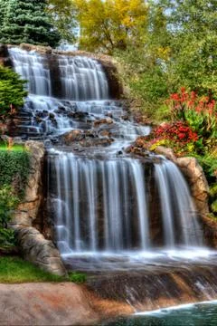 Silky waterfall in high dynamic range Stock Photos