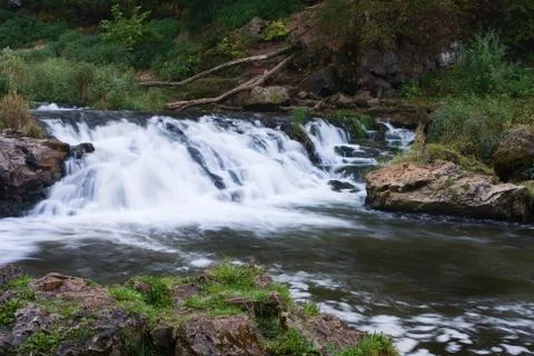 Silky waterfall on river. Stock Photos