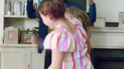 Silly, dance and children with babysitter in house, bonding and celebration for Stock Footage 335927992