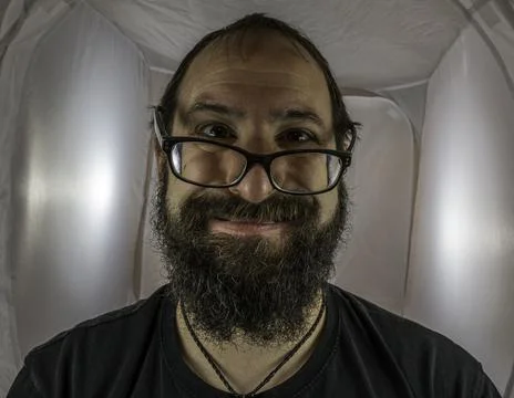 A silly looking bearded man with glasses Stock Photos