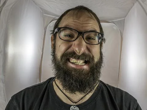 A silly looking bearded man with glasses Stock Photos