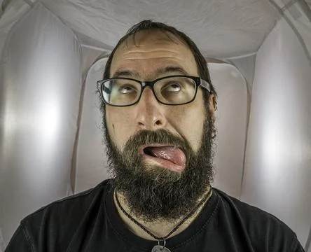 A silly looking bearded man with glasses Stock Photos