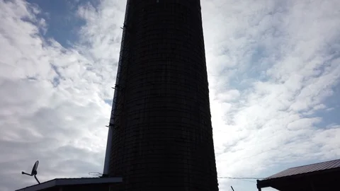 Silo with Clouds - Time lapse - Motion lapse Stockbeeldmateriaal 104111488