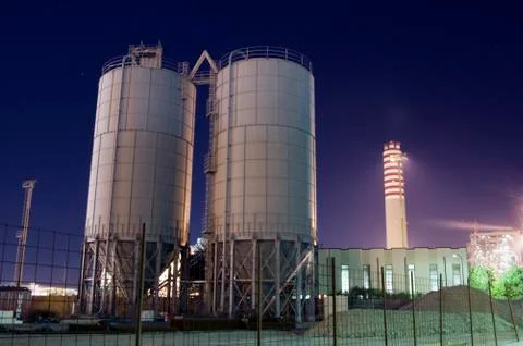 Silos and chimney Stock Photos