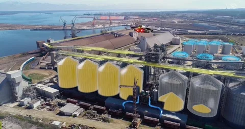 Silos for grain storage and processing. The metal granary tanks at the territory Stock Footage 332021995
