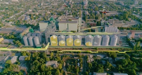 Silos for grain storage and processing. The metal granary tanks at the territory Vídeo Stock 332874453