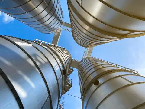 Silos or hopper storage Stock Photos