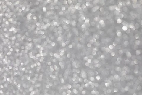 Silver abstract background with bokeh defocused lights Stock Photos