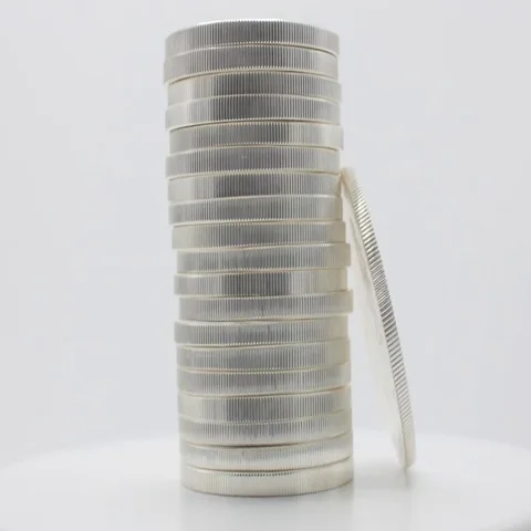 Silver American Eagle Coins Stack Isolated on White Rotating, 4K Stock Footage 69465483