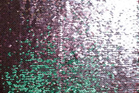 Silver and green sequin background. Stock-Fotos