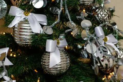 Silver and white Christmas tree decorations Stock Photos