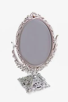 Silver antique mirror isolate Stock Photos