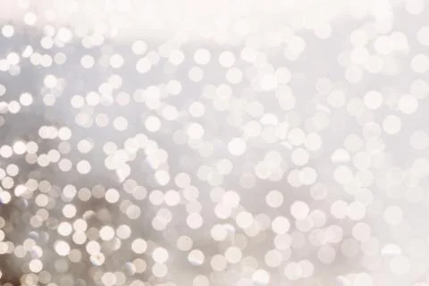 Silver background with glowing blurred circles Fotos de archivo