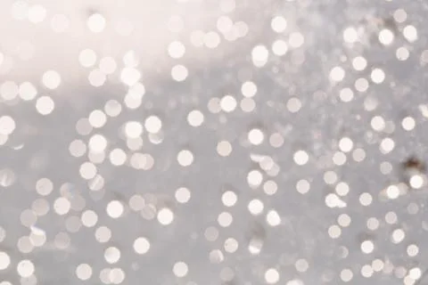 Silver background with glowing blurred circles Fotos de archivo