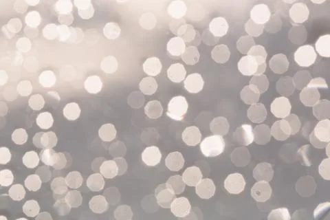Silver background with glowing blurred circles Fotos de archivo
