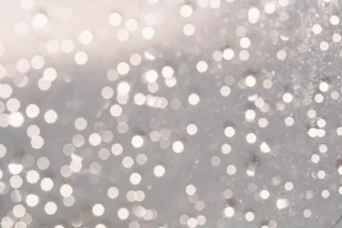 Silver background with glowing blurred circles Fotos de archivo