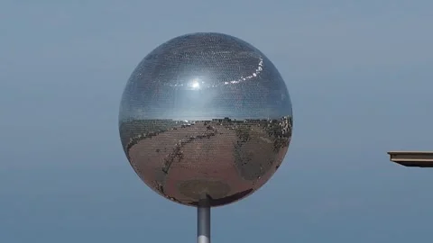 Silver Ball Shining Bright In Blackpool Pleasure Beach Video stock 251070094