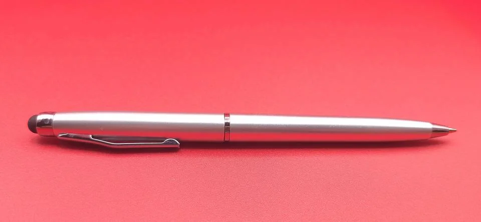 Silver ballpoint pen Stock Photos