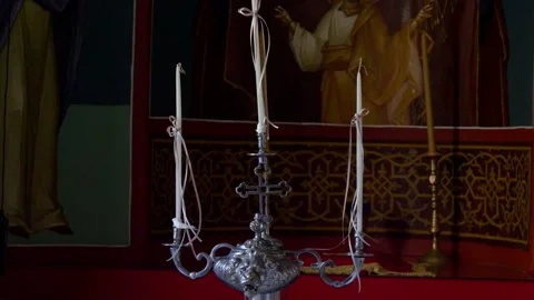 Silver Baptismal Candelabra with Three White Candles in Church Stock Footage 332162765