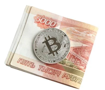 Silver bitcoin on the background of Russian banknotes Stock Photos