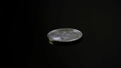 Silver Bitcoin on Black Background, Rotation Close-up Stockbeeldmateriaal 87800886